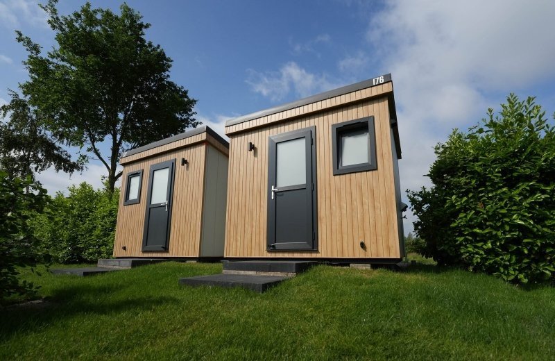 Tent pitch with private sanitary facilities