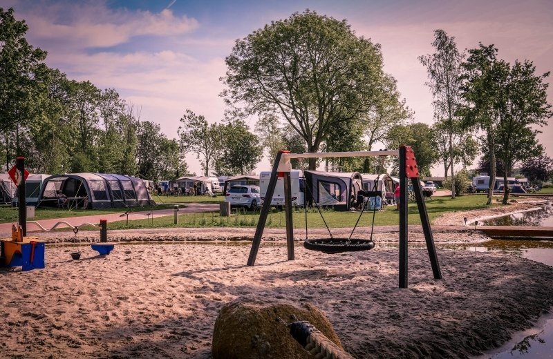 Comfort pitch with playground on field